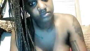 Dark skinned hottie putting her lovely tits on display for