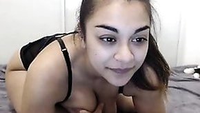 Voluptuous brunette sets her huge natural breasts free on t